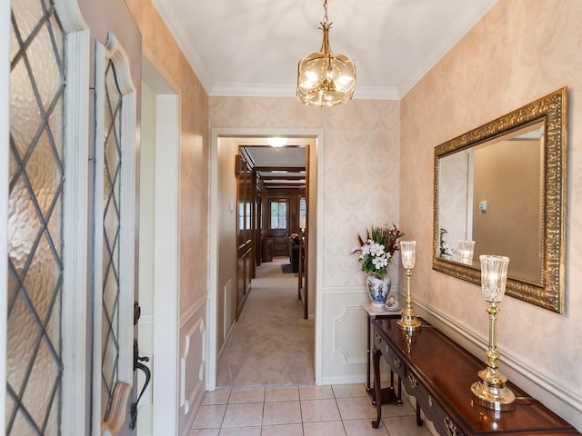 16707 Rugby Ct, Spring, TX 77379 - hall with a chandelier, light carpet, ornamental molding, and light tile patterned floors