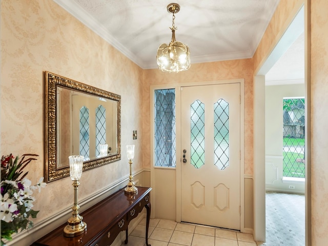 16707 Rugby Ct, Spring, TX 77379 - entryway featuring a chandelier, ornamental molding, and light tile patterned floors