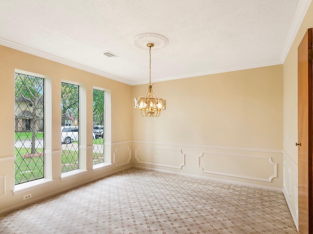 16707 Rugby Ct, Spring, TX 77379 - spare room with a chandelier, ornamental molding, and a wainscoted wall