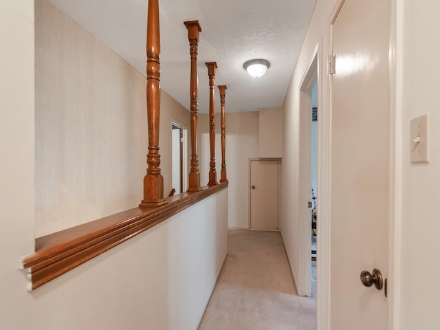 16707 Rugby Ct, Spring, TX 77379 - hallway featuring carpet flooring and a textured ceiling