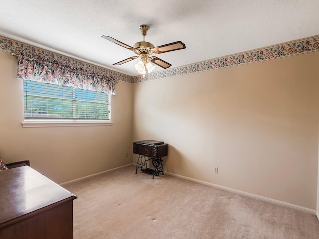 16707 Rugby Ct, Spring, TX 77379 - unfurnished office featuring a ceiling fan, light colored carpet, and baseboards