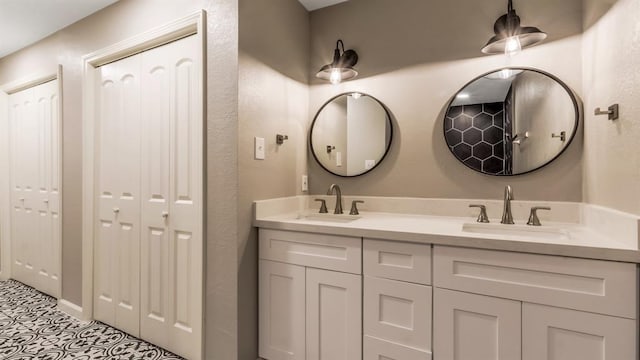 bathroom featuring double vanity and a sink