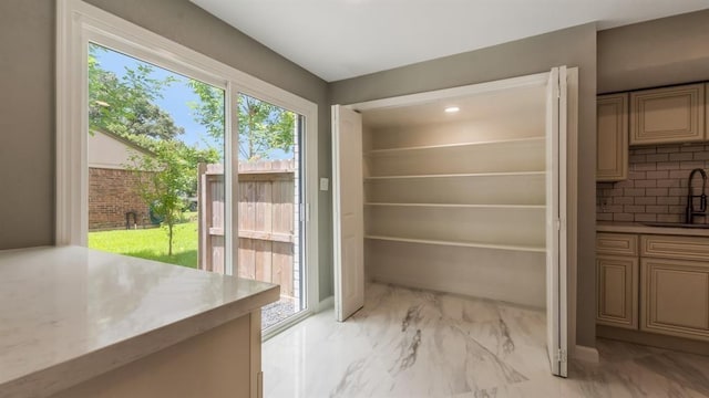 storage area featuring a sink