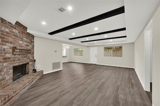 3350 Laurel Fork Dr, Houston, TX 77339 - unfurnished living room featuring recessed lighting, a fireplace, wood finished floors, and beamed ceiling