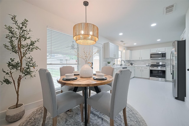 5615 Haven Point Dr, Houston, TX 77084 - dining room featuring visible vents and recessed lighting
