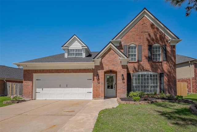 5615 Haven Point Dr, Houston, TX 77084 - traditional-style home featuring brick siding, driveway, fence, and a front yard