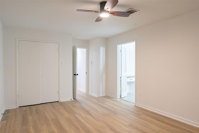 18007 Ravenfield Dr, Houston, TX 77084 - unfurnished bedroom with a closet, a ceiling fan, light wood-type flooring, baseboards, and visible vents