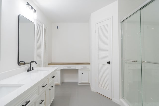 18007 Ravenfield Dr, Houston, TX 77084 - full bath with a stall shower, tile patterned floors, and a closet