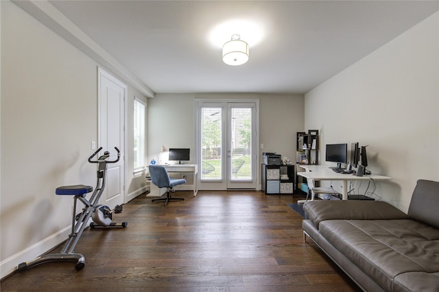 office featuring baseboards and dark wood finished floors