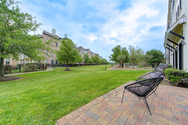 view of yard featuring a patio and fence