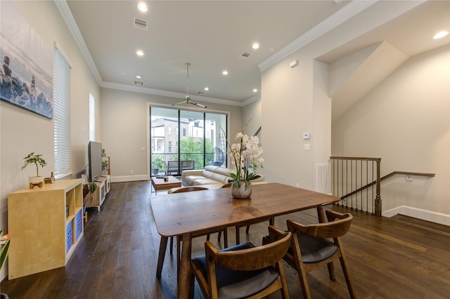 dining area featuring crown molding, dark wood finished floors, baseboards, visible vents, and recessed lighting