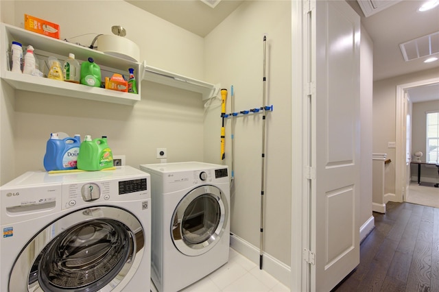 washroom with separate washer and dryer, wood finished floors, laundry area, visible vents, and recessed lighting