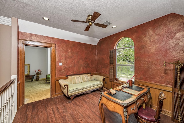 2926 Deer Creek Dr, Sugar Land, TX 77478 - living area with wood finished floors, a ceiling fan, a textured ceiling, a wainscoted wall, and recessed lighting