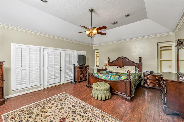 2926 Deer Creek Dr, Sugar Land, TX 77478 - bedroom featuring wood finished floors, vaulted ceiling, ceiling fan, ornamental molding, and a textured ceiling