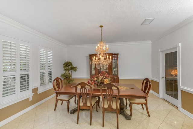 2926 Deer Creek Dr, Sugar Land, TX 77478 - dining space featuring crown molding, a chandelier, and baseboards
