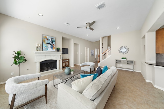 6123 Cameron Ct, League City, TX 77573 - living area featuring stairway, a fireplace with raised hearth, visible vents, ceiling fan, and recessed lighting