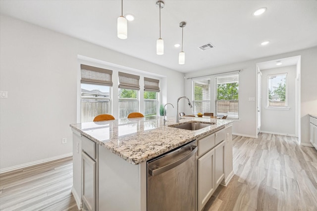 15039 Eves Necklace Ct, Cypress, TX 77433 - kitchen featuring dishwasher, baseboards, light wood finished floors, visible vents, and a sink