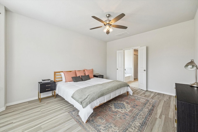 15039 Eves Necklace Ct, Cypress, TX 77433 - bedroom featuring light wood-type flooring, baseboards, visible vents, and a ceiling fan