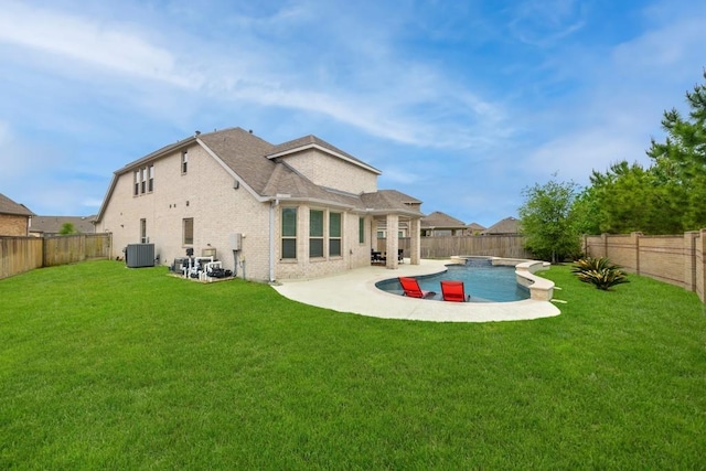 15039 Eves Necklace Ct, Cypress, TX 77433 - back of property with a fenced backyard, a patio, a yard, and central AC