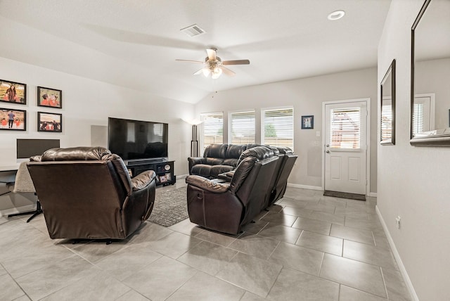 living room with light tile patterned floors, ceiling fan, baseboards, lofted ceiling, and visible vents