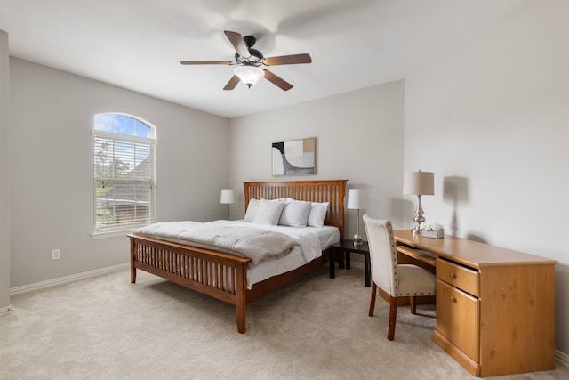 4911 Ontonagon Way, Spring, TX 77386 - bedroom featuring light carpet, baseboards, ceiling fan, and an office area