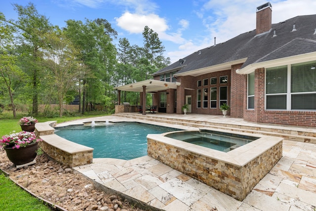 4911 Ontonagon Way, Spring, TX 77386 - outdoor pool with a patio area and an in-ground hot tub