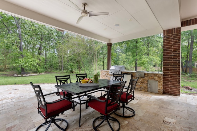 view of patio / terrace with grilling area, outdoor dining space, area for grilling, and ceiling fan