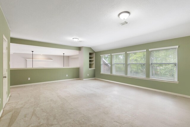 4911 Ontonagon Way, Spring, TX 77386 - carpeted empty room featuring a textured ceiling and baseboards