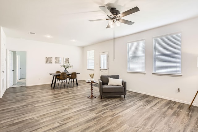 25617 Microstar Way, Montgomery, TX 77316 - living area with wood finished floors, a ceiling fan, baseboards, and recessed lighting