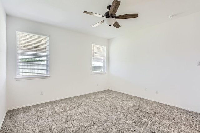 25617 Microstar Way, Montgomery, TX 77316 - empty room with healthy amount of natural light, carpet, a ceiling fan, and baseboards