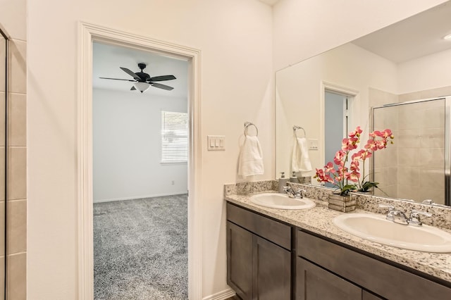 25617 Microstar Way, Montgomery, TX 77316 - bathroom featuring double vanity, a ceiling fan, and a tile shower