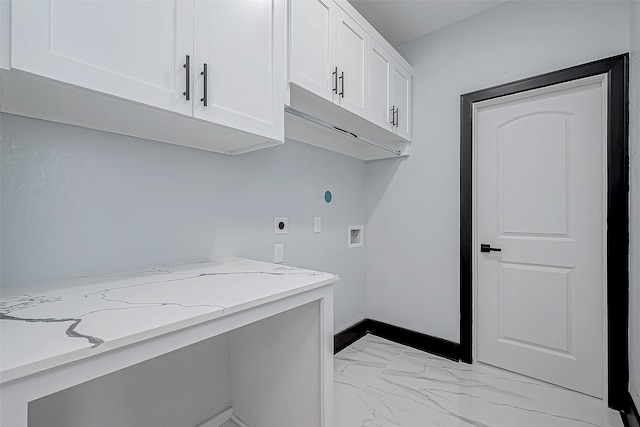 laundry room featuring washer hookup, baseboards, marble finish floor, electric dryer hookup, and cabinet space