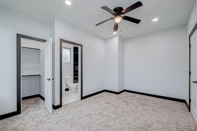 unfurnished bedroom with baseboards, recessed lighting, a ceiling fan, ensuite bath, and carpet floors