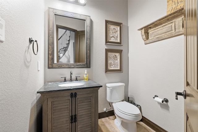 12606 Mostyn Ct, Magnolia, TX 77354 - half bath featuring vanity, toilet, and baseboards