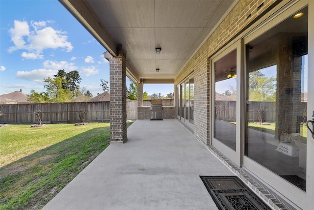 12606 Mostyn Ct, Magnolia, TX 77354 - view of patio / terrace featuring a fenced backyard, grilling area, and area for grilling