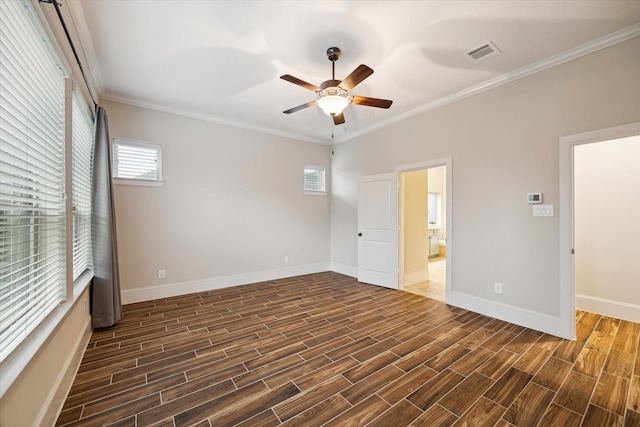 31021 Harvest Meadow Ln, Spring, TX 77386 - unfurnished bedroom with dark wood finished floors, ornamental molding, and a ceiling fan