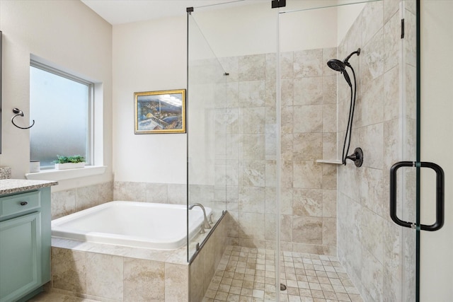 31021 Harvest Meadow Ln, Spring, TX 77386 - full bath with a stall shower, a bath, and vanity