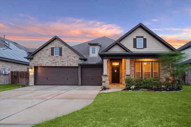 31021 Harvest Meadow Ln, Spring, TX 77386 - view of front facade with concrete driveway, roof with shingles, brick siding, and an attached garage