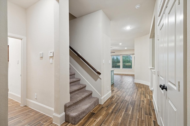 31021 Harvest Meadow Ln, Spring, TX 77386 - stairway with wood finished floors, recessed lighting, and ceiling fan
