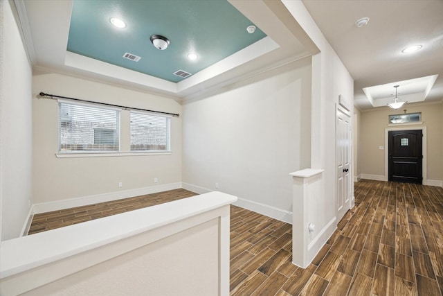 31021 Harvest Meadow Ln, Spring, TX 77386 - hall featuring a raised ceiling, dark wood-style floors, and recessed lighting