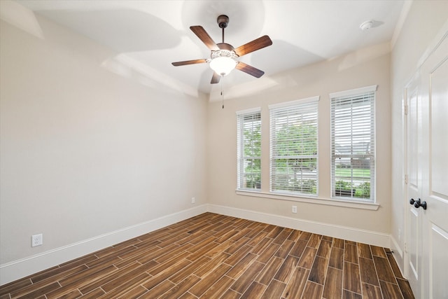 31021 Harvest Meadow Ln, Spring, TX 77386 - unfurnished room featuring dark wood-style floors, ceiling fan, and a smoke detector