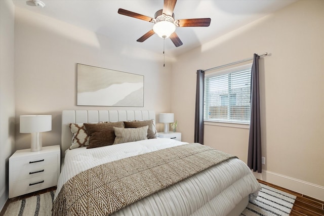 31021 Harvest Meadow Ln, Spring, TX 77386 - bedroom featuring wood finished floors and a ceiling fan
