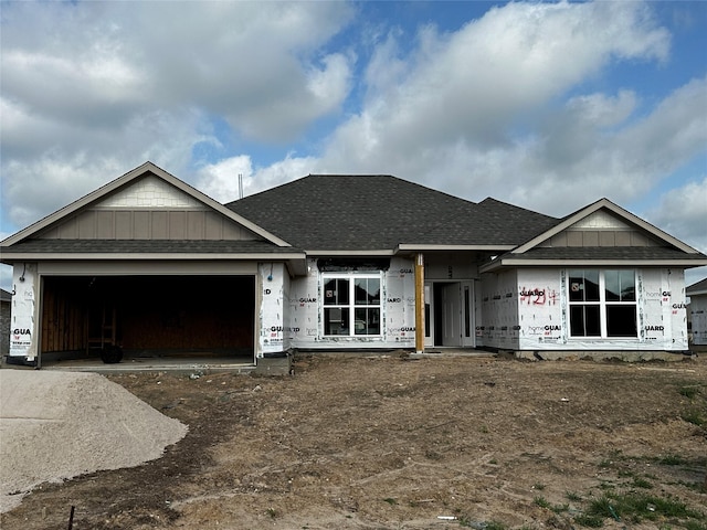 4214 Leslies Way, Dickinson, TX 77539 - property under construction with a garage, roof with shingles, and driveway
