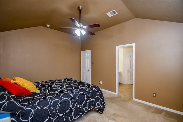bedroom featuring carpet floors, visible vents, baseboards, and lofted ceiling