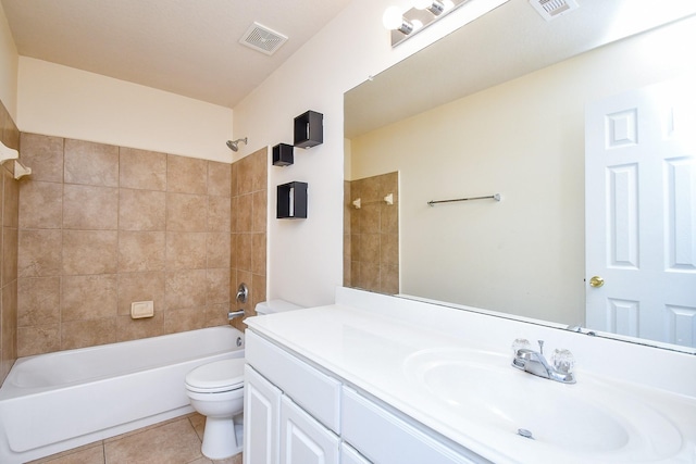 full bathroom with toilet,  shower combination, visible vents, and tile patterned flooring