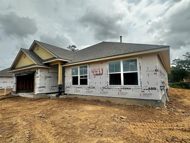 4411 Karam Lndg, Dickinson, TX 77539 - view of front of property with a shingled roof and an attached garage