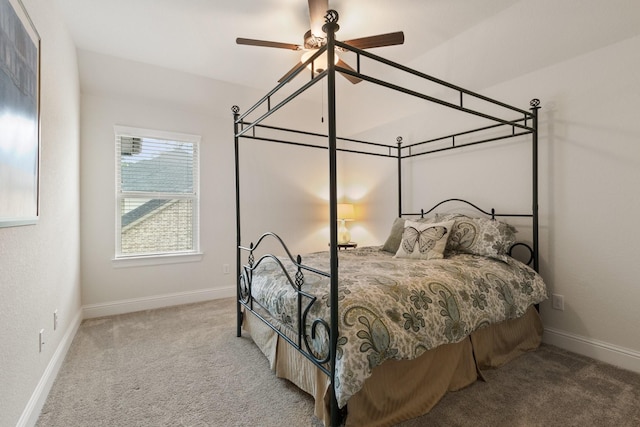 1002 Timberland Bay Ct, Pinehurst, TX 77362 - bedroom featuring ceiling fan, baseboards, and carpet floors