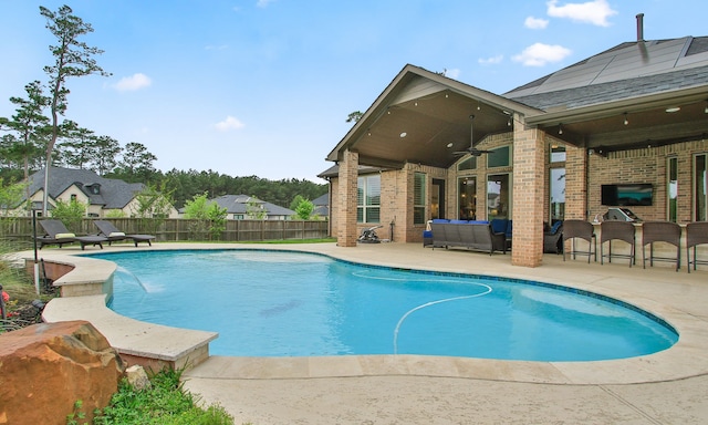 1002 Timberland Bay Ct, Pinehurst, TX 77362 - view of pool with ceiling fan, a fenced backyard, a patio, outdoor dry bar, and a fenced in pool