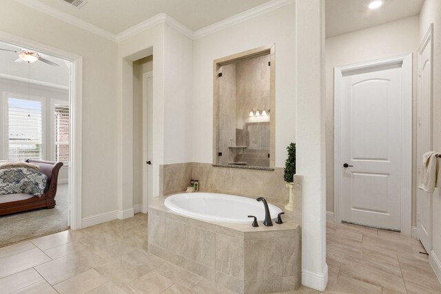 1002 Timberland Bay Ct, Pinehurst, TX 77362 - bathroom featuring ensuite bathroom, a ceiling fan, crown molding, tiled shower, and a garden tub