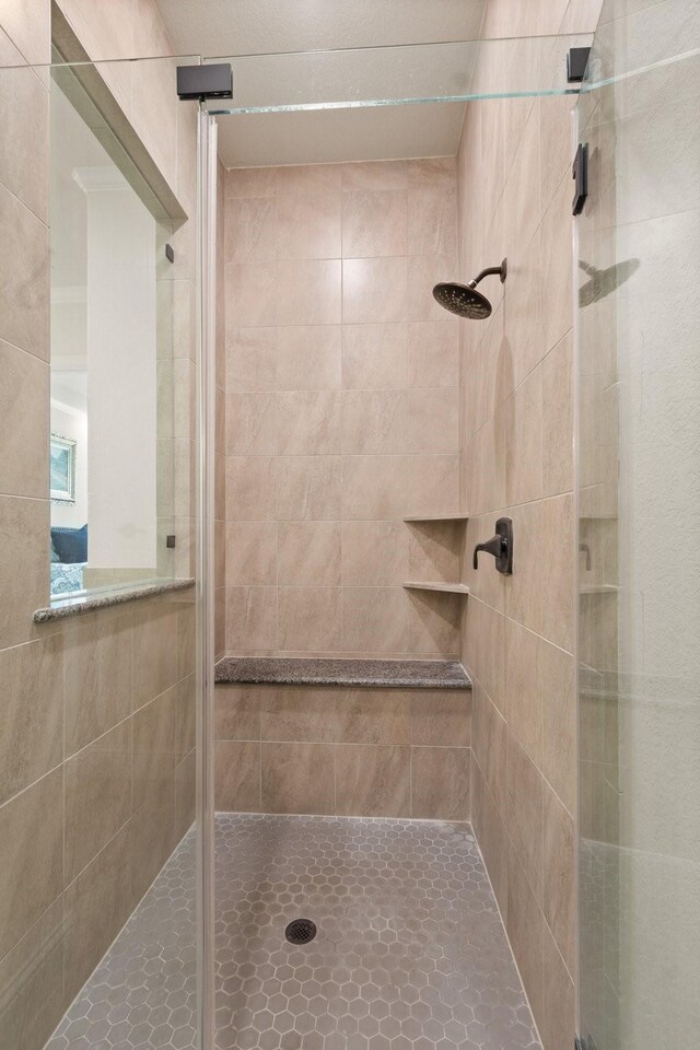 1002 Timberland Bay Ct, Pinehurst, TX 77362 - full bathroom featuring a stall shower